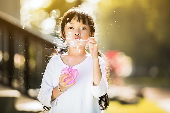 blowing bubbles as a teaching tactic